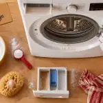 nettoyer machine à laver bicarbonate de soude vue flat-lay